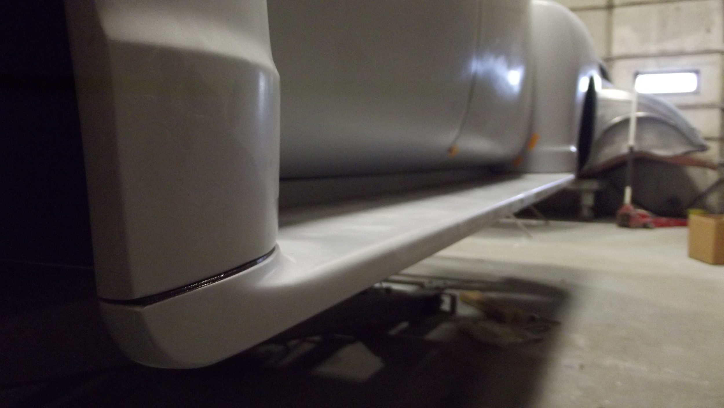 Running board rear fender gap RH